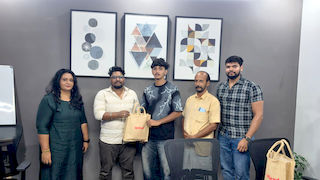 upGrad Dehradun office - student and parents with the counselling team after their study abroad session
